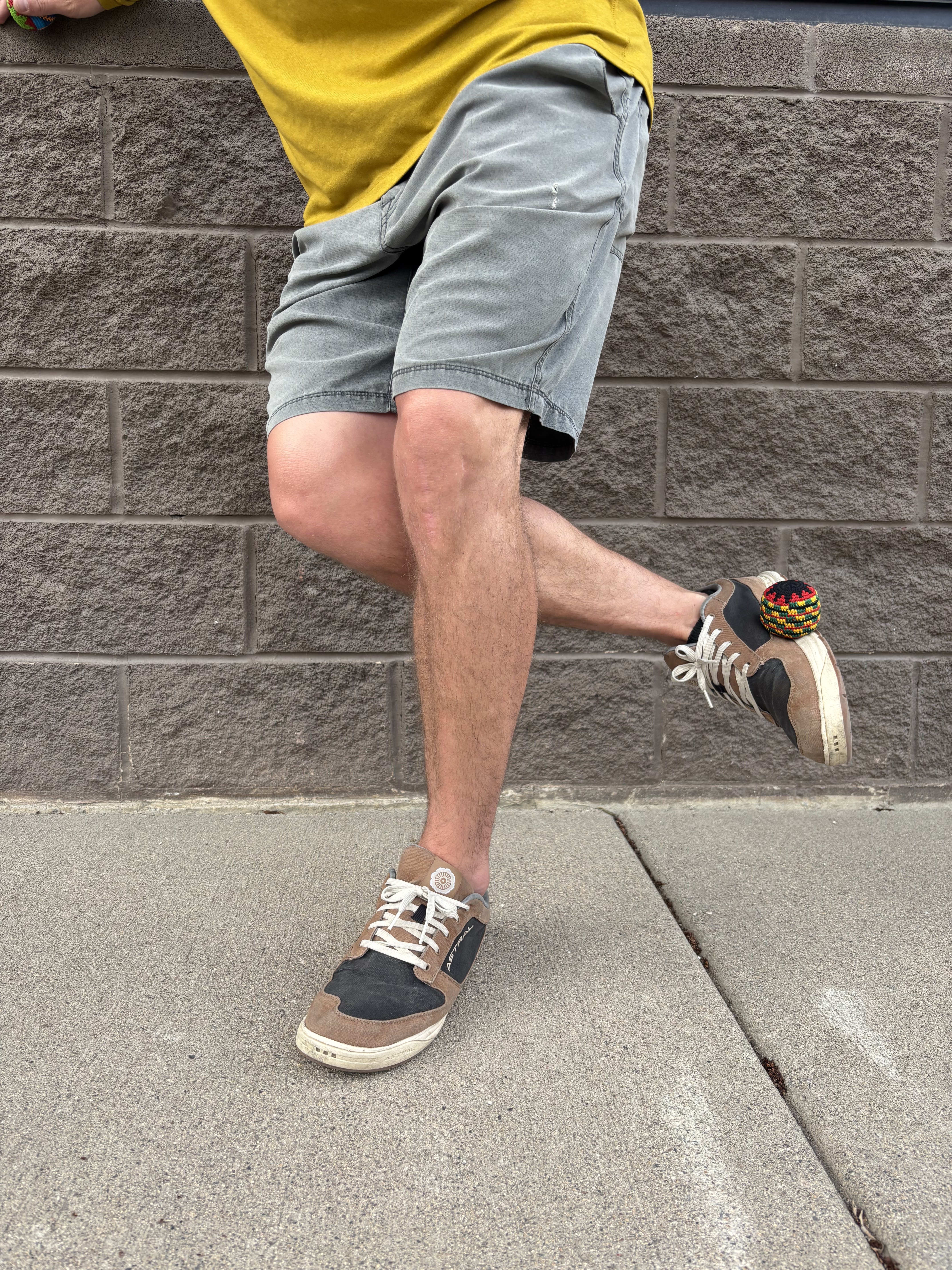 Footbag session on the sidewalk